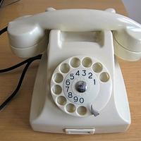 Telefono a disco in bachelite bianco