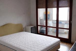 Stanza in appartamento condiviso