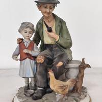Stupendo Capodimonte d'epoca:"Nonno con nipotina"