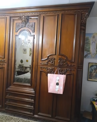 armadio, comodini e testata letto