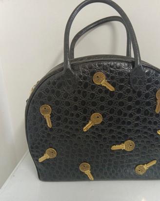 BORSA MOSCHINO VINTAGE IN PELLE CON DETTAGLI ORO 