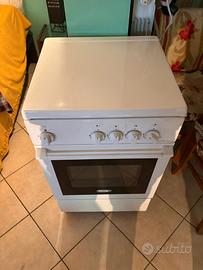 Piano cottura 4 fuochi + forno elettrico DeLonghi