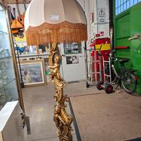 Lampada dorata con putti