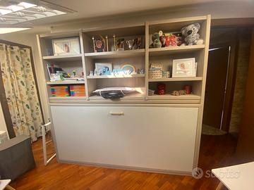 Libreria con letto a scomparsa