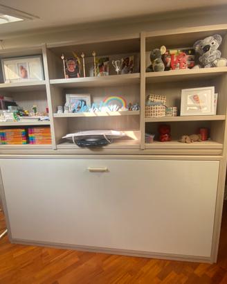 Libreria con letto a scomparsa