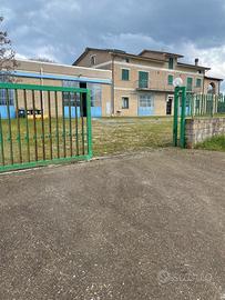 Immobile con Officina, magazzini, appartamenti