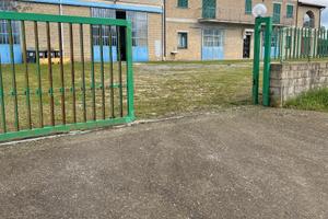 Immobile con Officina, magazzini, appartamenti