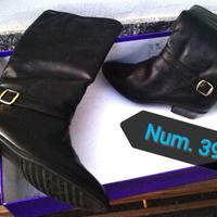 1 paio di stivali in pelle, da donna