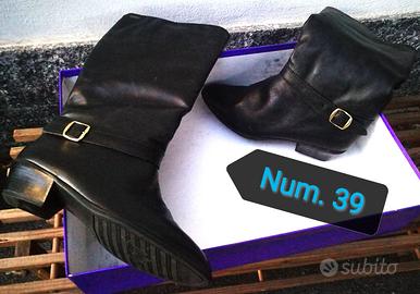 1 paio di stivali in pelle, da donna