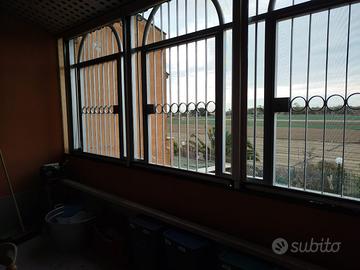 Appartamento con veranda e posto auto