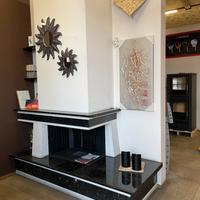 Camino aperto con rivestimento sconto 50%