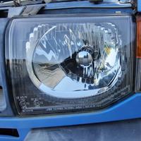MITSUBISHI PAJERO 1998 - FARO ANTERIORE SINISTRO