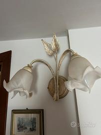 Elegante applique a due luci in ferro battuto