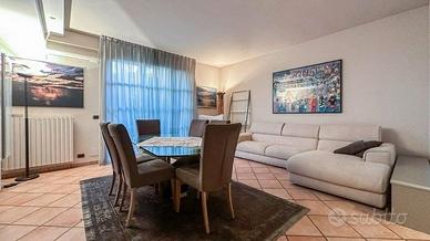 Quadri decorativi e poltrona girevole in alcantara