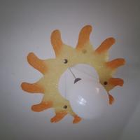 Lampada gialla a forma di sole