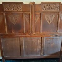 Testiera letto in legno decorata