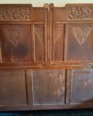 Testiera letto in legno decorata