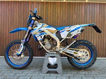 TM 125 EN