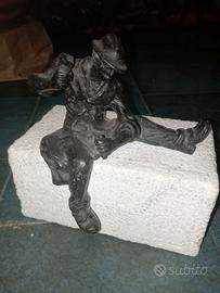 Scalpellino bronzo su marmo di Carrara