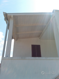 Veranta in legno lamellare