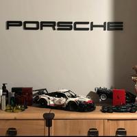 scritta porsche da muro