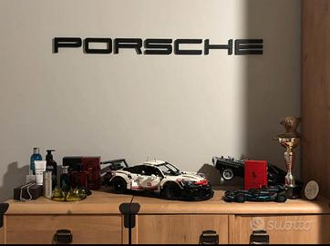 scritta porsche da muro