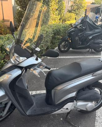 Honda SH 150i dopoio freno a disco