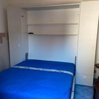 Armadio letto richiudbile con scrivania pari al nu