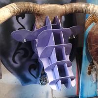 mucca in ferro e corna vere