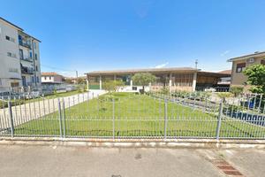 Capannone e terreno edificabile