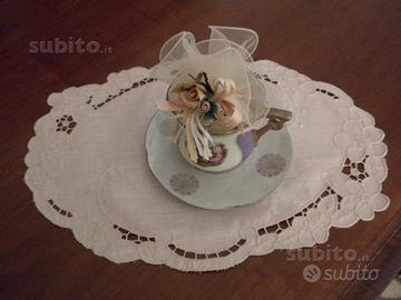 Centrino ovale di misto lino colore rosa