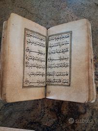 libro antico corano