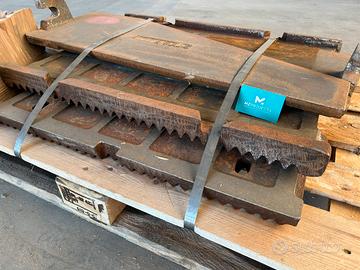 Mascelle, corazze, martelli per frantoi e mulini