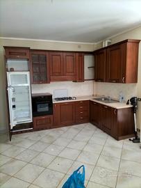 Cucina in legno ad angolo