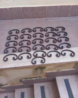 Ricci a "c" in ferro battuto 