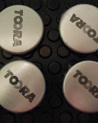 Quattro tappi coprimozzo Toora nuovi
