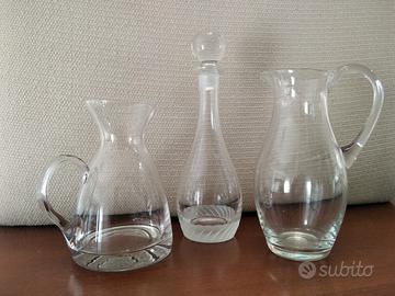 Brocche e bottiglia in cristallo