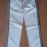 Pantaloni bianco panna con bande laterali nere 