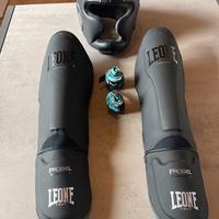Paratibie Leone + Casco PWR NUOVI