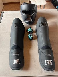 Paratibie Leone + Casco PWR NUOVI