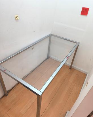 tavolo in acciaio cromato e vetro