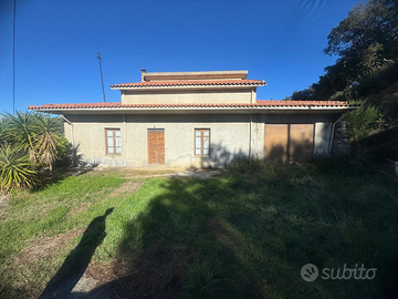 Villa singola e terreno