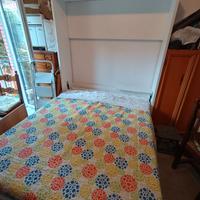 Letto retraibile con scomparsa a muro