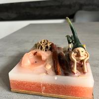 Candela decorativa con folletto