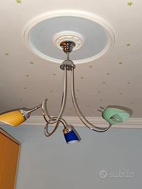 Lampadario in acciaio cromato a tre braccia