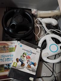 Nintendo wii nera con giochi e accessori