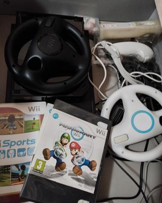 Nintendo wii nera con giochi e accessori