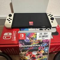 Nintendo switch oled + giochi + accessori