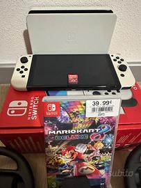 Nintendo switch oled + giochi + accessori