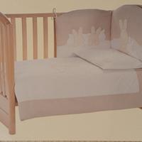 Piumone e paracolpi lettino bimbi